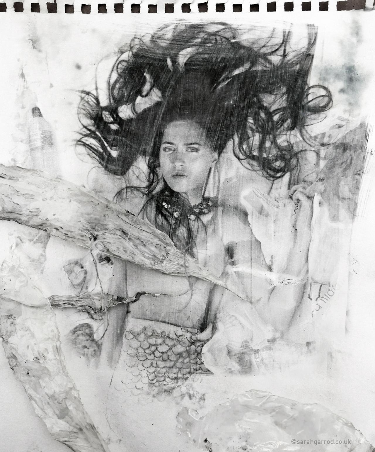 An artistic photograph showing a mermaid